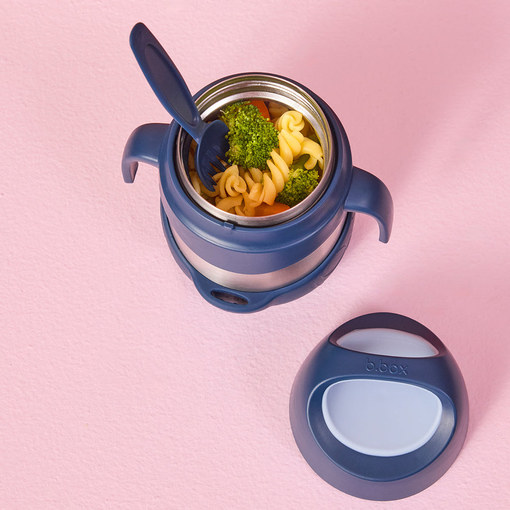 b.box midnight Blue thermos container with food inside on a pink background