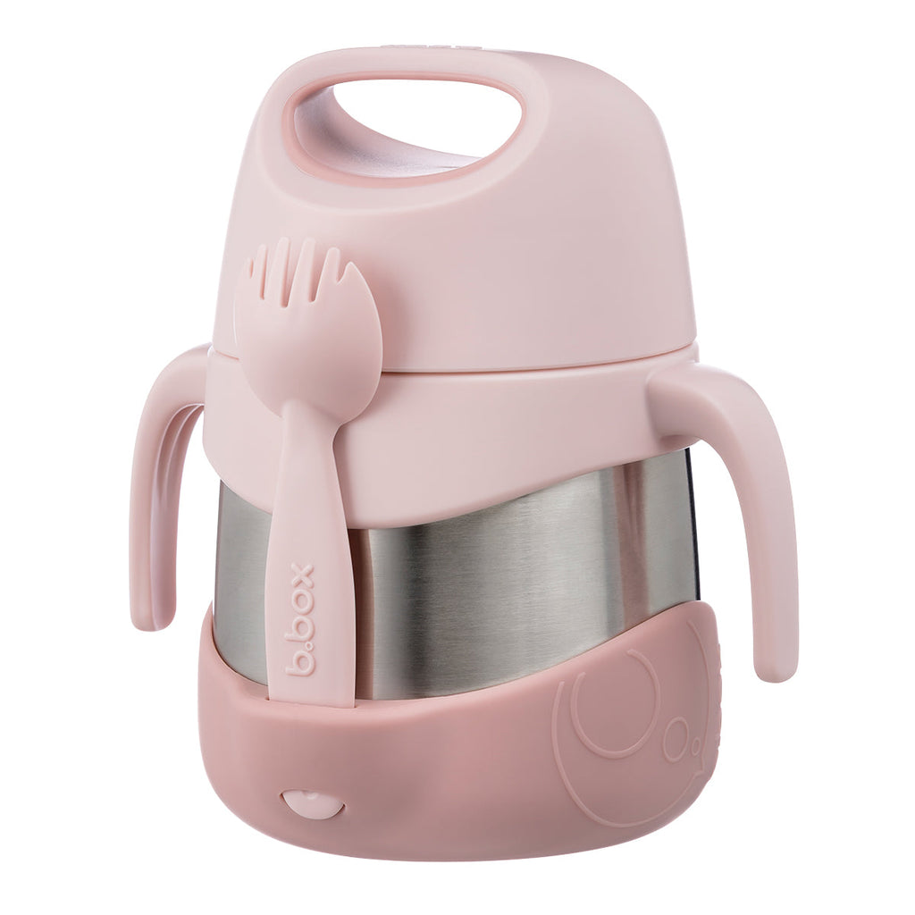 Pink thermos with spoon and fork attachment on a white background