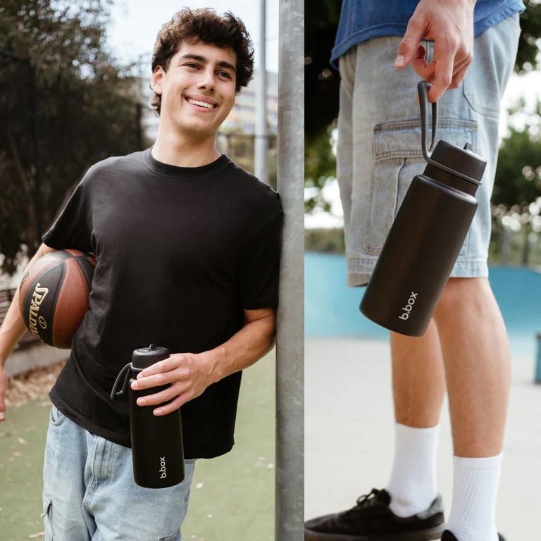 bbox flip top 1 litre drink bottle in black deep space colour in sports field